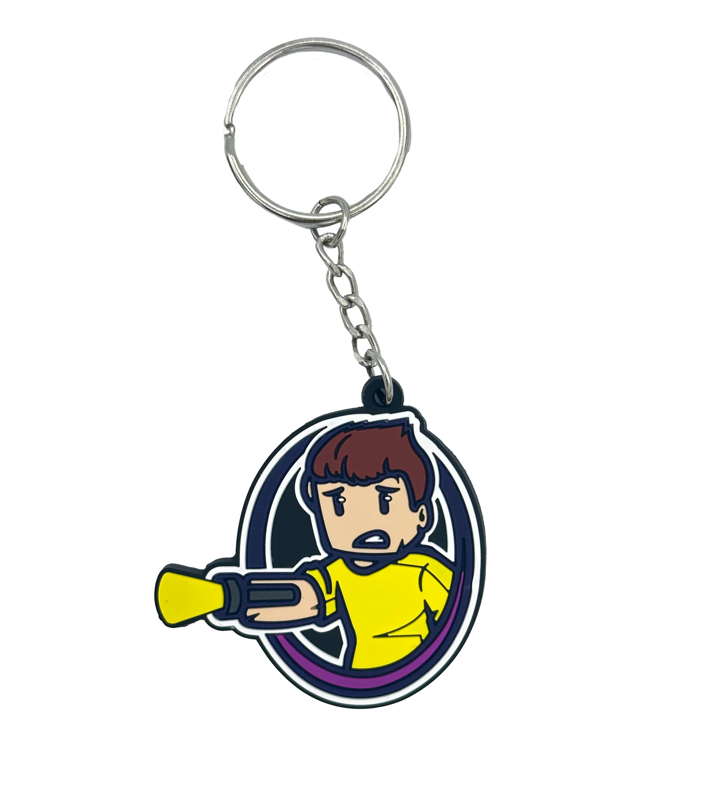 Schlüsselanhänger mit Tjulfar-Logo – Comicfigur im gelben Shirt mit Laserarm, violettem Kreisrahmen und Schlüsselring mit Kette. Gefertigt aus flexiblem Gummi, ideal für Schlüsselbund, Tasche oder als Fanartikel.