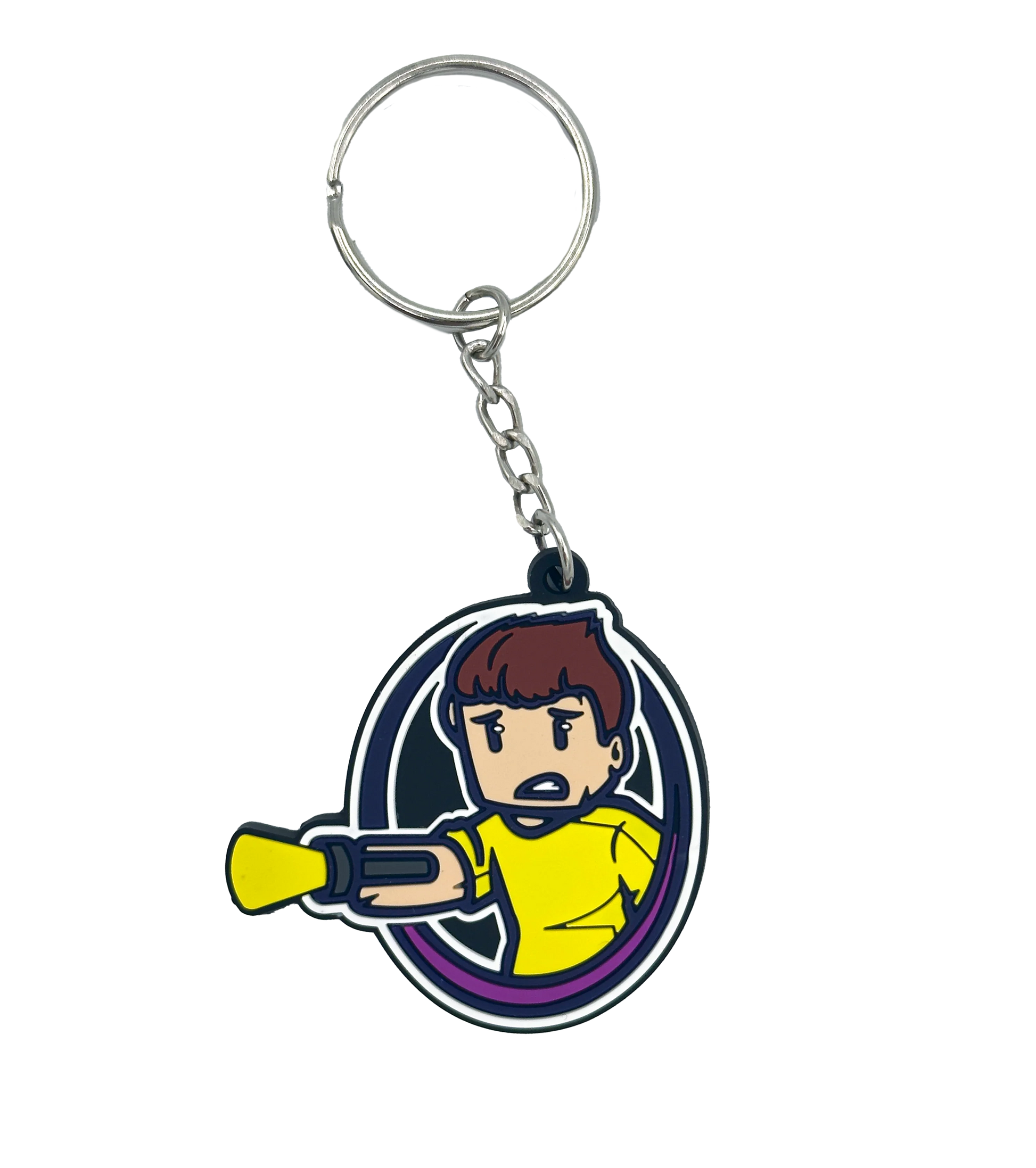 Schlüsselanhänger mit Tjulfar-Logo – Comicfigur im gelben Shirt mit Laserarm, violettem Kreisrahmen und Schlüsselring mit Kette. Gefertigt aus flexiblem Gummi, ideal für Schlüsselbund, Tasche oder als Fanartikel.